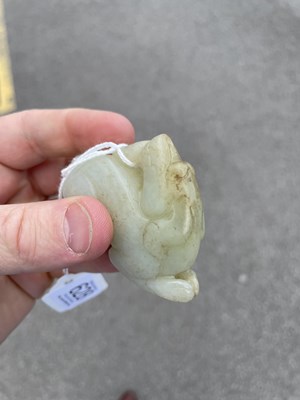 Lot 628 - A CHINESE JADE RAM CARVING