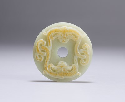 Lot 645 - A CHINESE JADE BI DISC