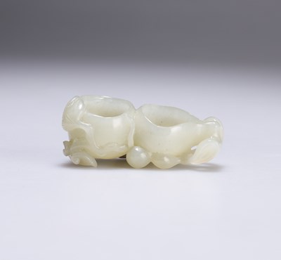 Lot 669 - A CHINESE JADE SMALL DOUBLE GOURD BRUSHWASHER