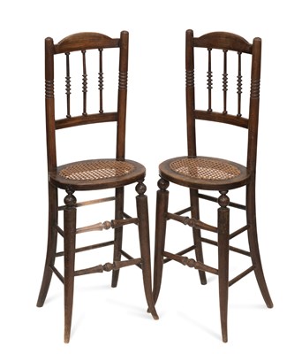 Lot 1226 - A PAIR OF 19TH CENTURY FAUX ROSEWOOD AND CANEWORK CORRECTION CHAIRS