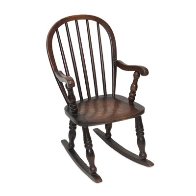 Lot 704 - A 19TH CENTURY ELM AND OAK CHILD'S WINDSOR ROCKING CHAIR