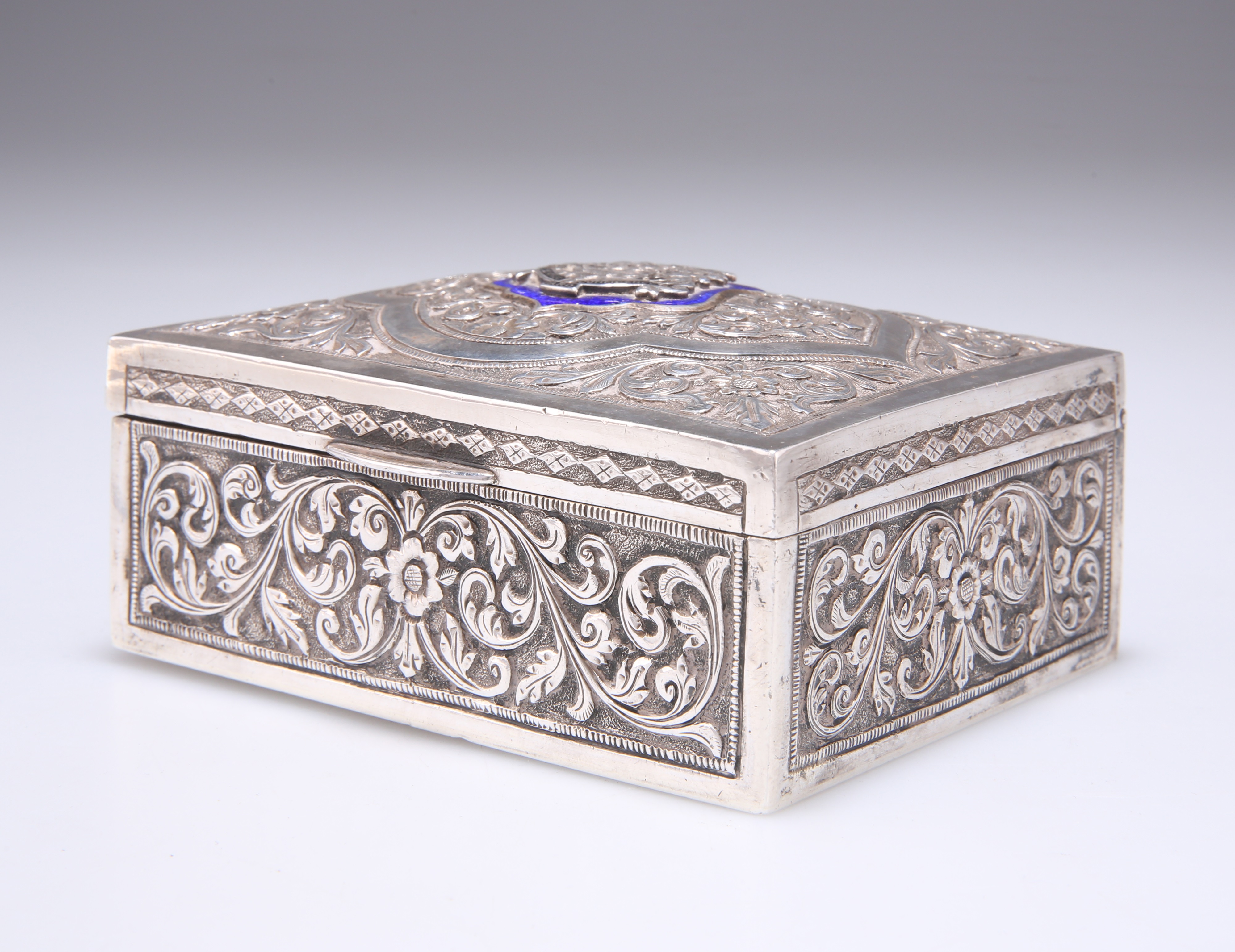 Lot 33 - AN INDIAN SILVER AND ENAMEL CIGARETTE BOX